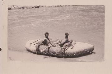 Fern and Bill Davis in 11 1/2-ft. canvas-covered neoprene raft.  About 10 min. downriver from Rapid 22, Cataract Canyon