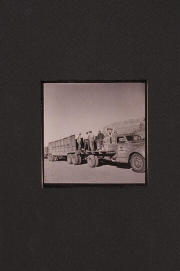 Unloading boats at Cliff Dweller's Lodge.  Boat in truck trailer with Art Greene's truck ready to take it