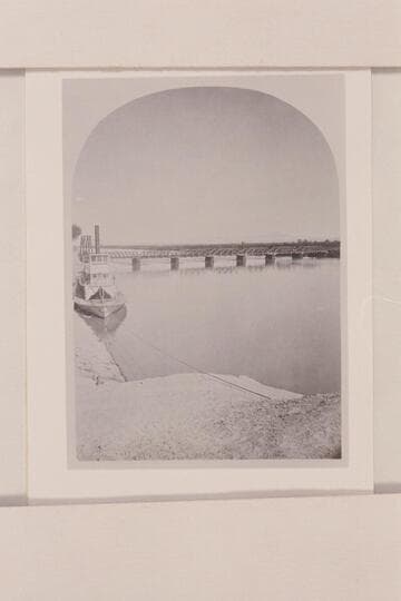 Southern Pacific bridge at Yuma.  The river steamer "Gila" is moored above the bridge