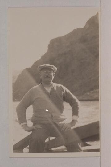 Adolph Sutro sitting on the sweep of the Hyde scow