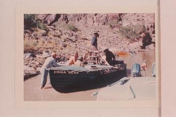 Preparing the "Emma Dean" for pictures at Bright Angel Creek.  Herb Hirst is at left.  Doc Hill is the far side of the boat.  John Doerr is sitting in the fore cockpit.  Larry Sanderson stands by the chair and Rod Sanderson is aft