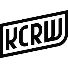 A black and white logo with letters "KCRW" in a shape.